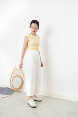 Pastel yellow minimal vest with crop sleeves