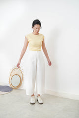 Pastel yellow minimal vest with crop sleeves