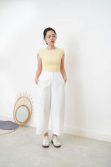 Pastel yellow minimal vest with crop sleeves