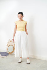 Pastel yellow minimal vest with crop sleeves