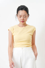 Pastel yellow minimal vest with crop sleeves