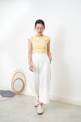 Pastel yellow minimal vest with crop sleeves
