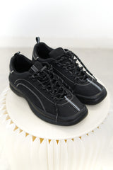Black outlined shoes