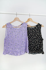 Black vest in peplum hem