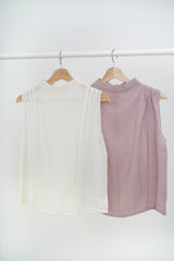 Ivory high neck blouse in pleats shoulders