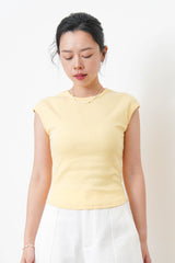 Pastel yellow minimal vest with crop sleeves