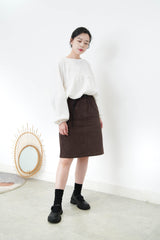 White cross cutting top in elastic hem