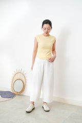 Pastel yellow minimal vest with crop sleeves