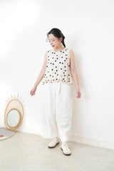 Ivory dotted vest w/ ruffles hem