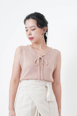 Knit vest w/ string details collar