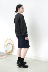 Black assy. Hem pullover w/ ribbon detail