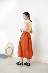 Pastel yellow minimal vest with crop sleeves