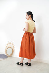 Pastel yellow minimal vest with crop sleeves