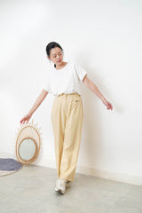 light yellow trousers