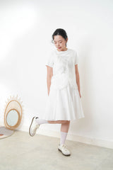 White A line peplum skirt w/ embroidery