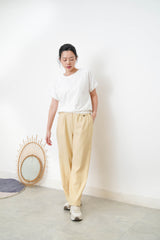 light yellow trousers