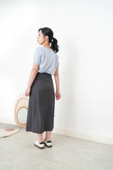 Blue knit top w/ ribbon collar details