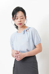 Blue knit top w/ ribbon collar details