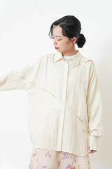 Ivory shirt w/ dash cut out