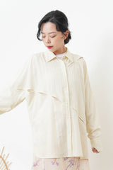 Ivory shirt w/ dash cut out