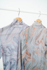 Blue marble print turtle neck top