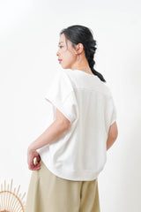 White 3D cut pullover in sphere hem