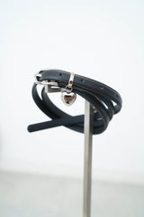 Leather belt with heart pendant