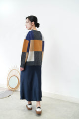 Orange mixed square pattern sweater