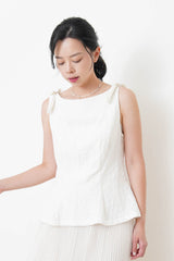 White boat neck premium vest w/ ribbon details