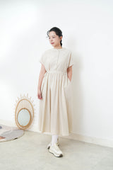 Beige one piece w/ waist string