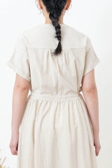 Beige one piece w/ waist string