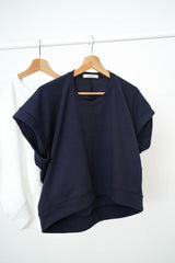 White 3D cut pullover in sphere hem