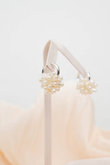 Ring earrings w/ blooming flower