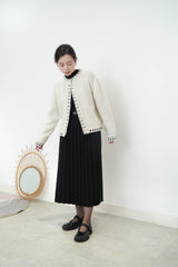 Ivory 100% wool cardigan in outline stitching