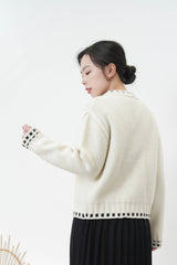 Ivory 100% wool cardigan in outline stitching