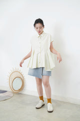 Mint shirt w/ peplum hem details