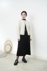 Ivory 100% wool cardigan in outline stitching