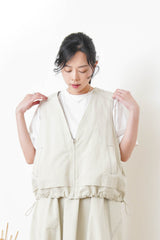 Ivory worker style vest w/ elastic hem