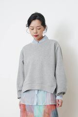 Grey soft pullover in split hem