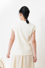 Cream split hem vest w/ gather waist details