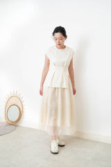 Cream split hem vest w/ gather waist details