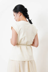 Cream split hem vest w/ gather waist details