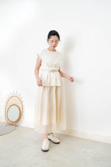 Cream split hem vest w/ gather waist details
