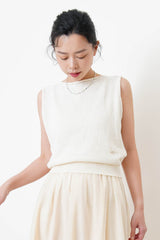 Ivory minimal cutting knit vest