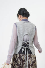 Ivory knit vest w/ strings back details
