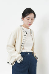 Ivory 100% wool cardigan in outline stitching