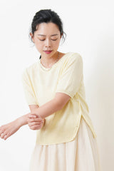 Lemon knit top w/ buttons split hem
