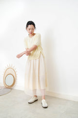 Lemon knit top w/ buttons split hem