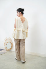 Butter vest with details pleats hem