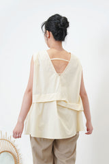 Butter vest with details pleats hem